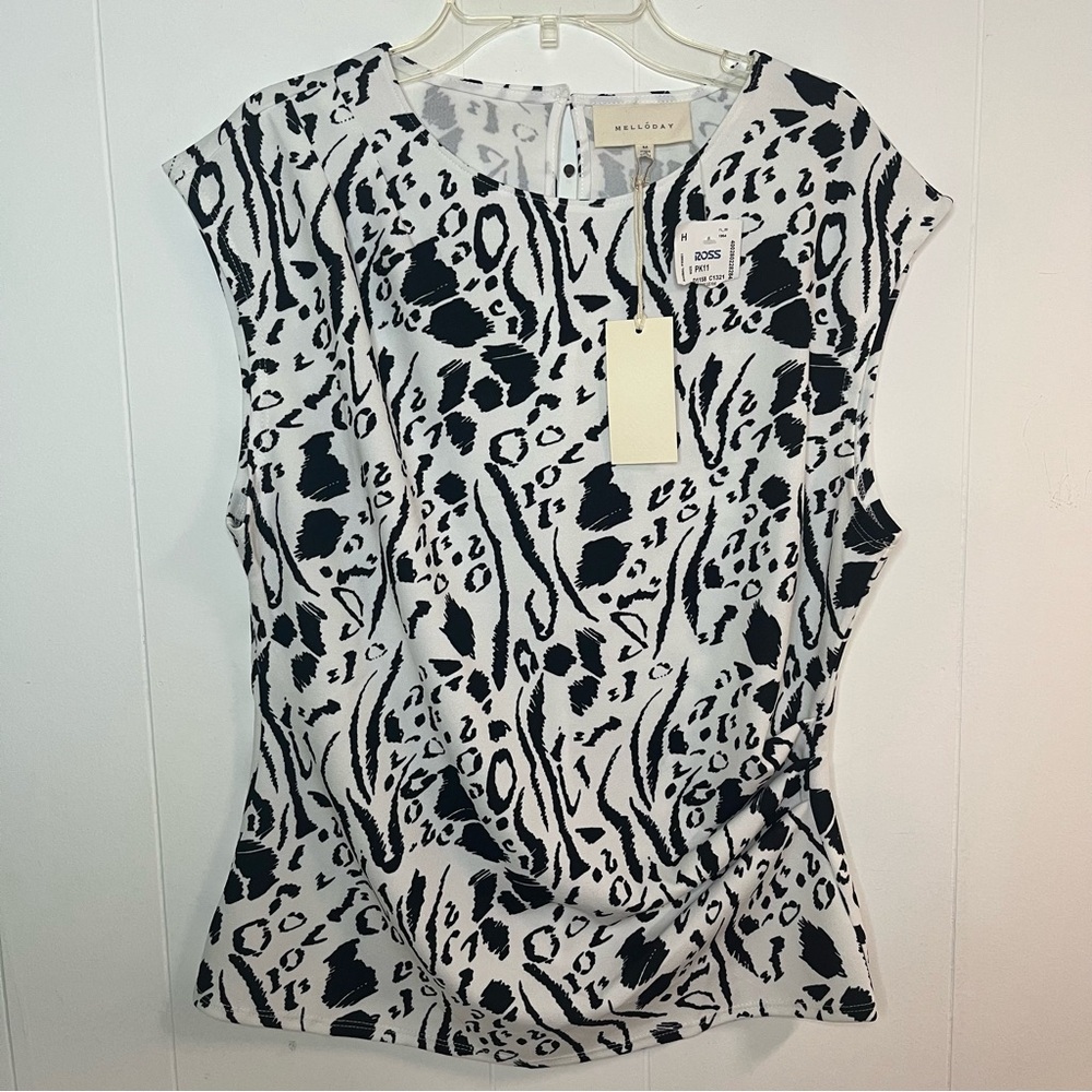 White and black animal print zoo print sleeveless blouse